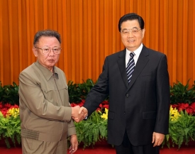 Kim Čong-il s čínským prezidentem.